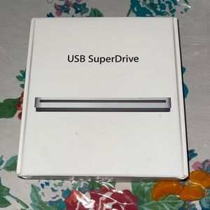 USB SuperDrive. External disc system. Allows Macbook users to use discs.